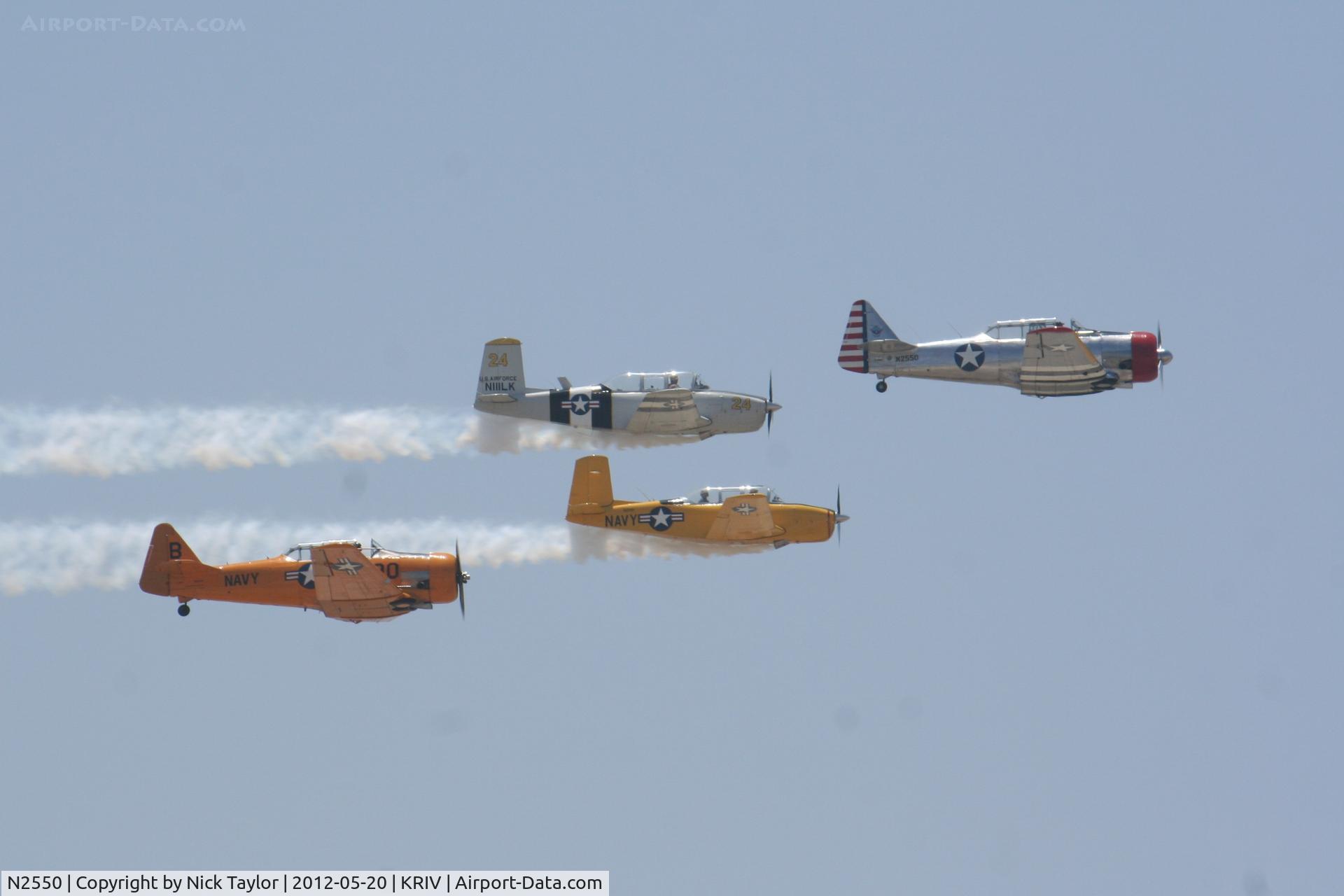 N2550, 1985 North American SNJ-5 Texan C/N 43683, Leading the formation