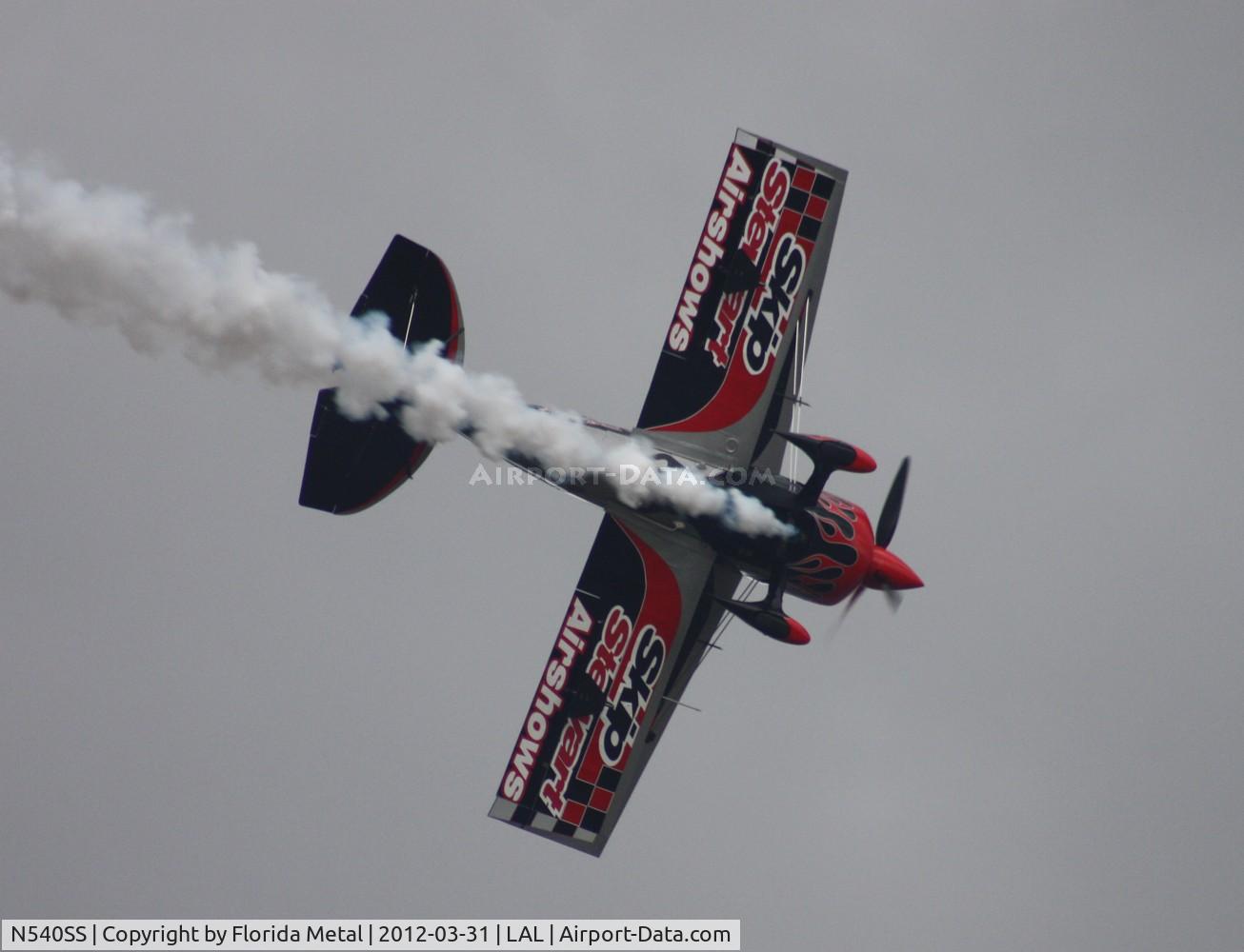 N540SS, 2011 Pitts S-2S Special C/N 006, Skip Stewart Pitts approaching T-storm