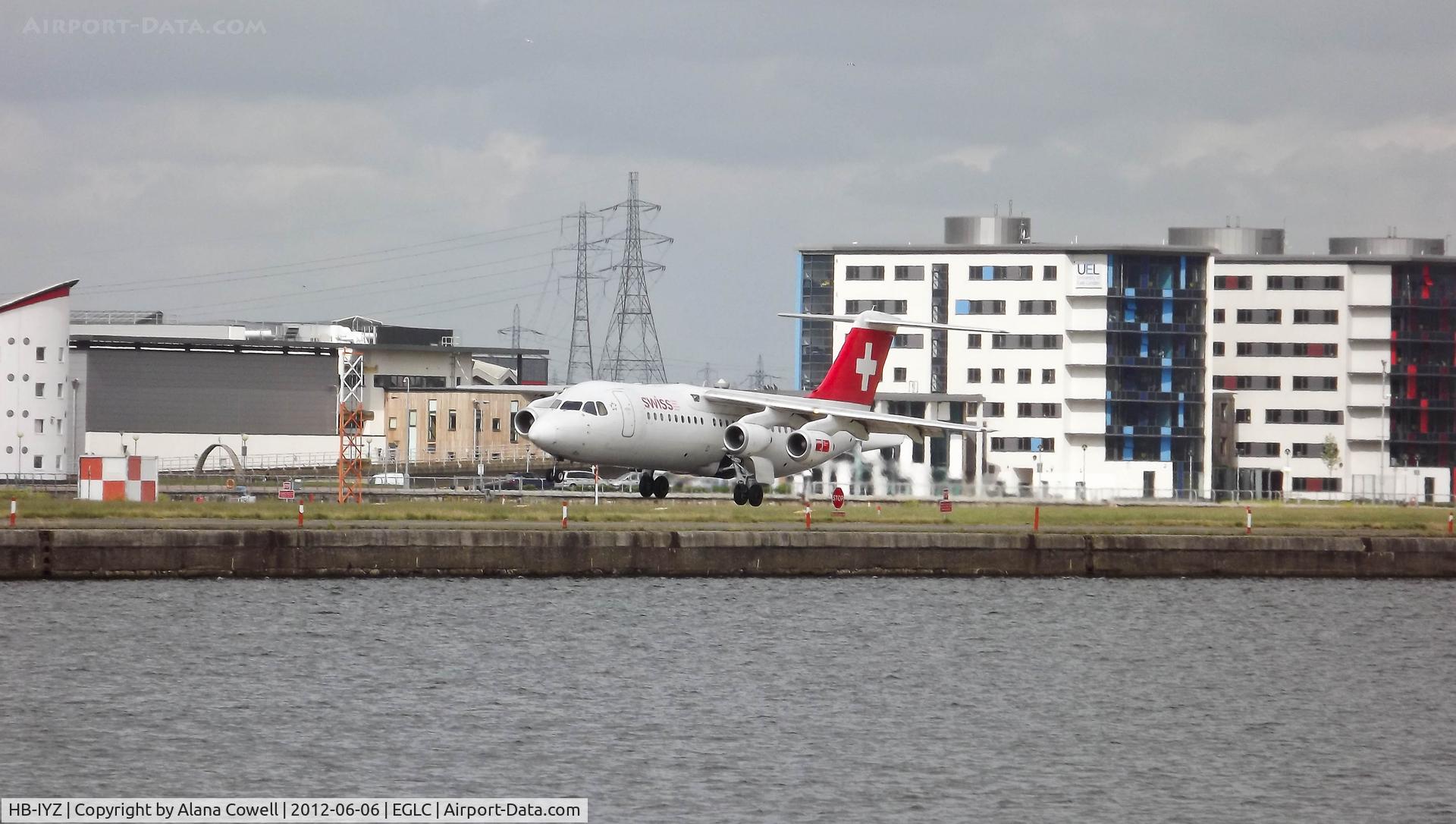 HB-IYZ, 1998 British Aerospace Avro 146-RJ100 C/N 0338, HB-IYZ arriving at London City Airport.
