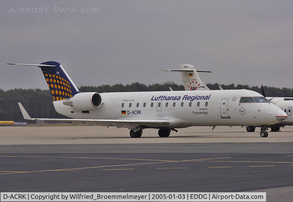 D-ACRK, 2004 Bombardier CRJ-200ER (CL-600-2B19) C/N 7901, Parked on Main Apron. Original Radome damaged, another used with standard Eurowings c/s on.