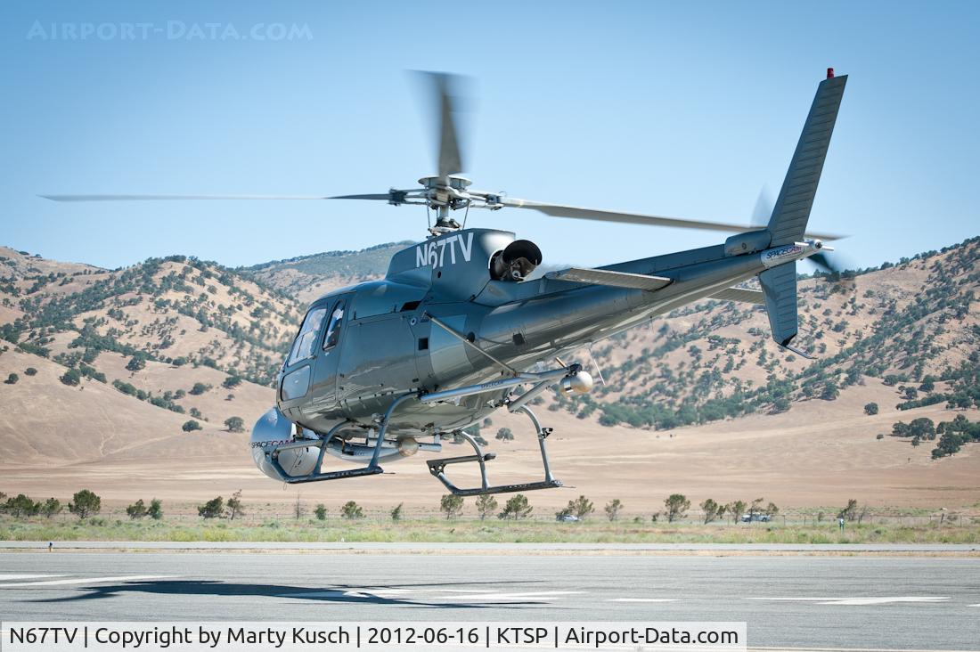 N67TV, 1995 Eurocopter AS-350B-2 Ecureuil Ecureuil C/N 2859, Departing ramp.