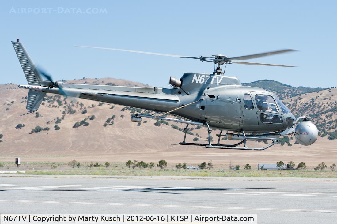 N67TV, 1995 Eurocopter AS-350B-2 Ecureuil Ecureuil C/N 2859, Departing the ramp.