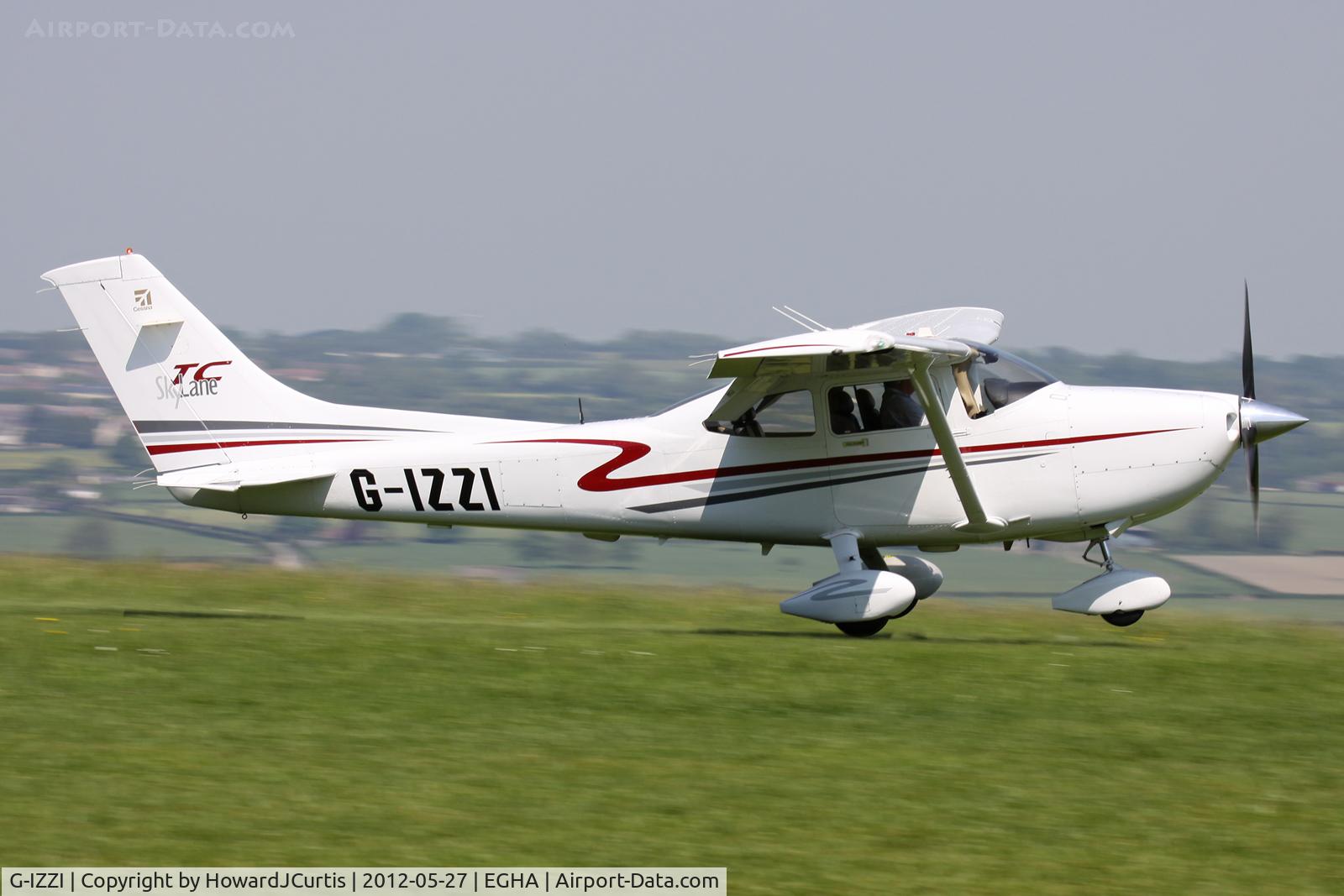 G-IZZI, 2001 Cessna T182T Turbo Skylane C/N T18208100, Just about to touch down.