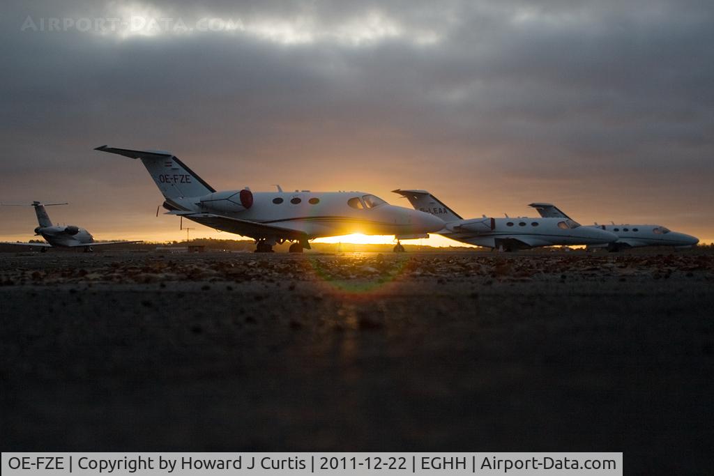OE-FZE, 2009 Cessna 510 Citation Mustang Citation Mustang C/N 510-0217, Unusual early morning shot of three Citation Mustangs and a 525 on the Signature apron.