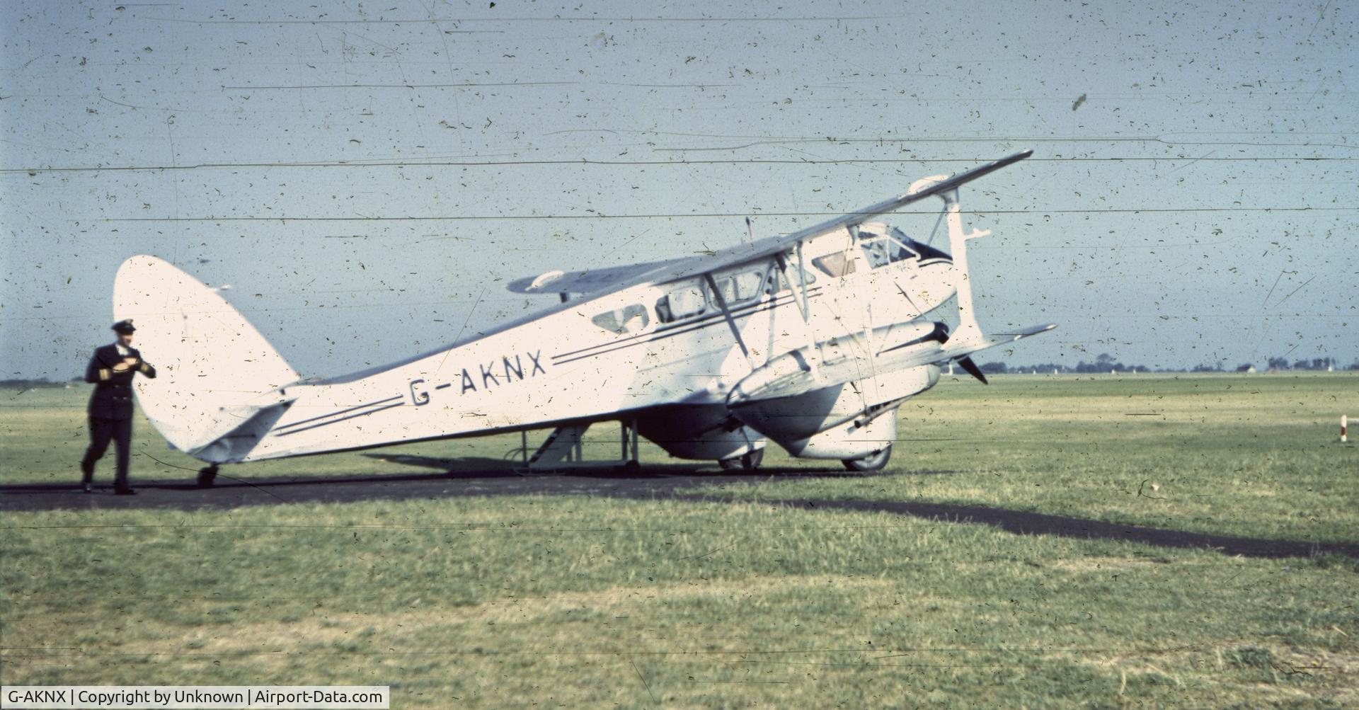G-AKNX, 1942 De Havilland DH-89A Dominie/Dragon Rapide C/N 6629, Slide found in my collection, believed taken on Jersey, Channel Islands