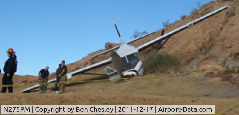 N275PM, 1987 Cessna 208A Cargomaster C/N 208-00119, 17th hole Canyonlands Golf Course