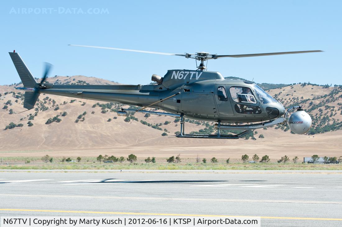 N67TV, 1995 Eurocopter AS-350B-2 Ecureuil Ecureuil C/N 2859, Departing the ramp.