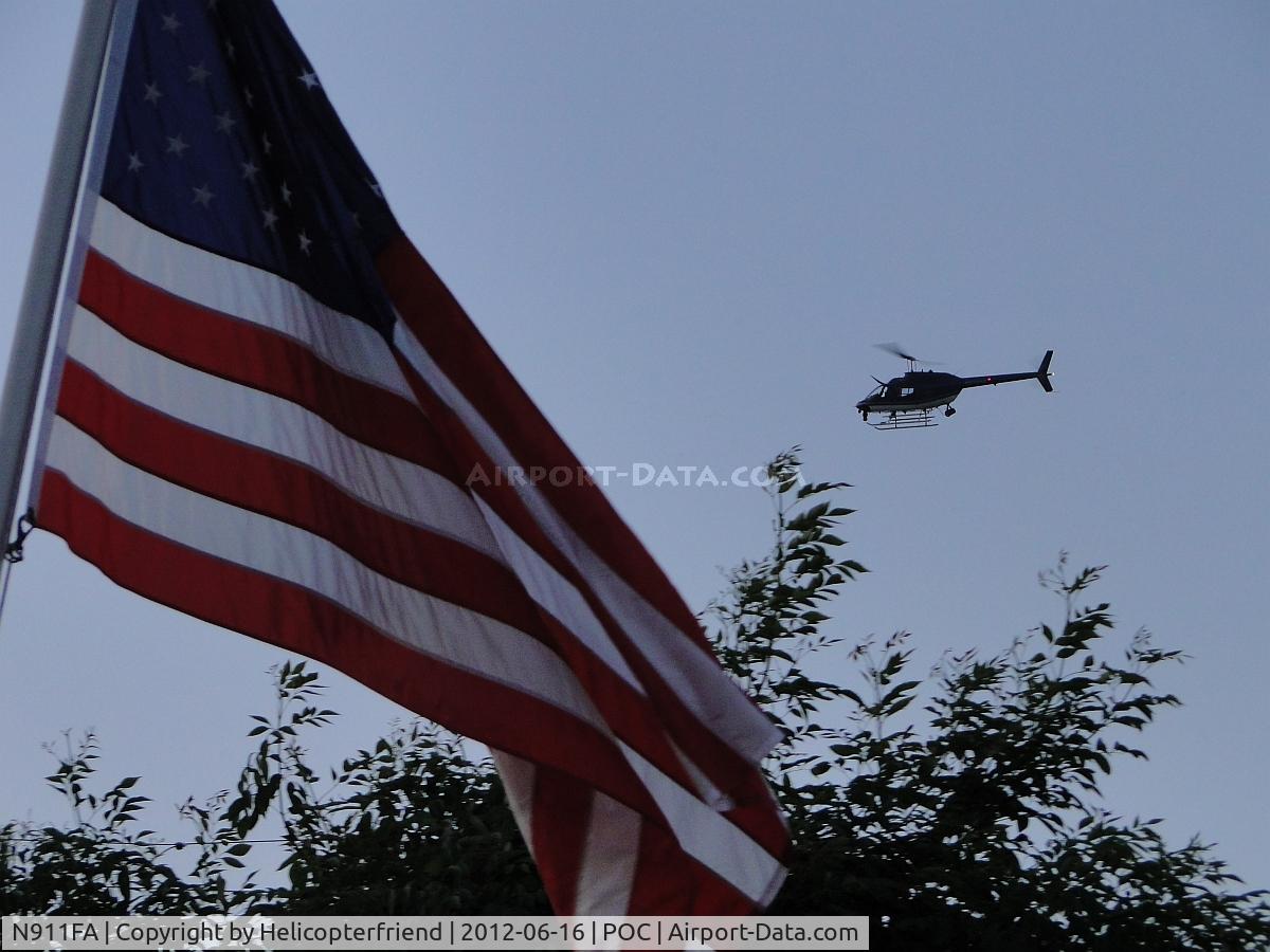 N911FA, Bell OH-58A Kiowa C/N 70-15152, Orbiting while assisting Law Enforcement personnel northside of Brackett Airspace