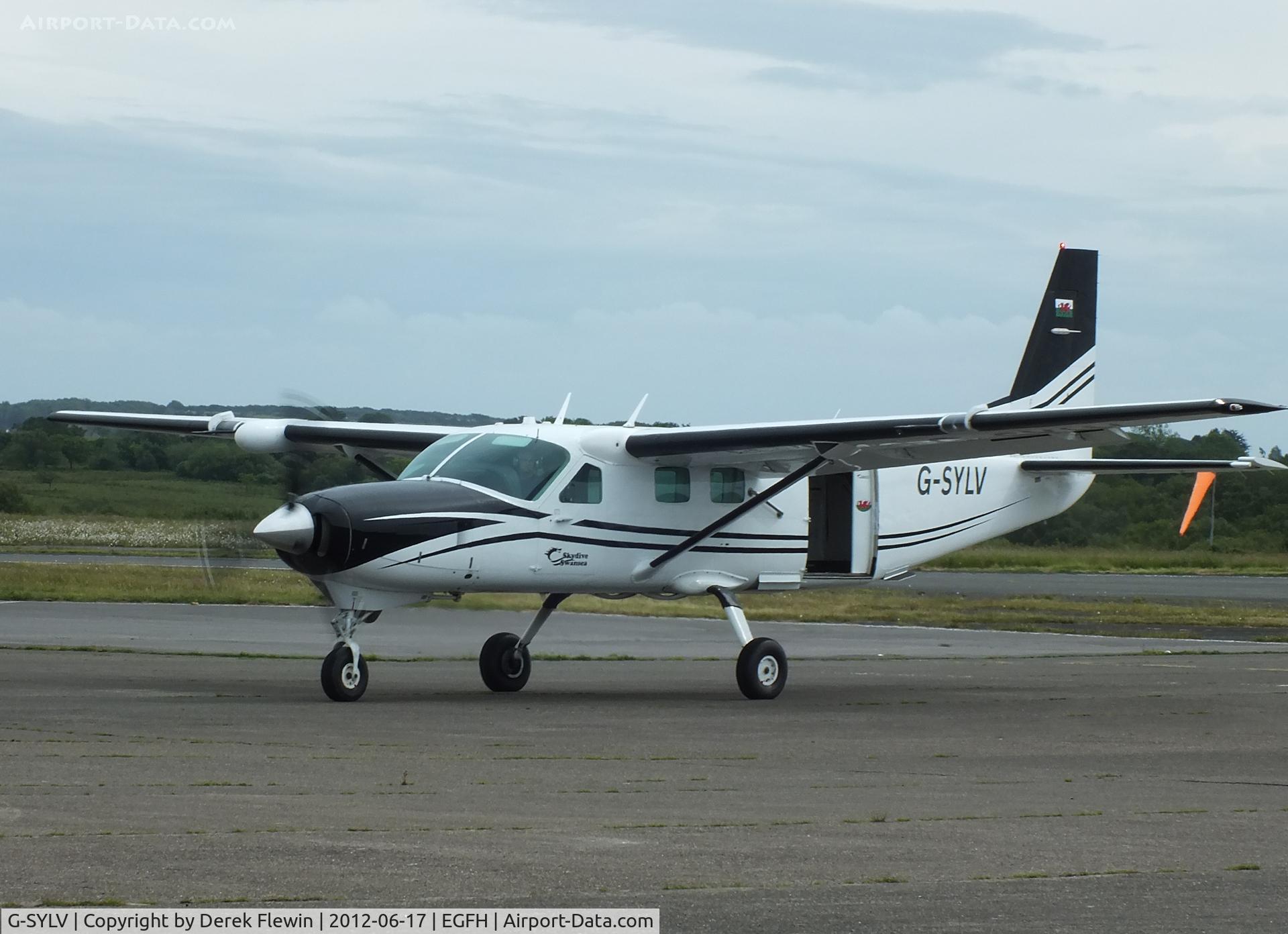 G-SYLV, 2002 Cessna 208B  Grand Caravan C/N 208B0936, Going to the pumps.
