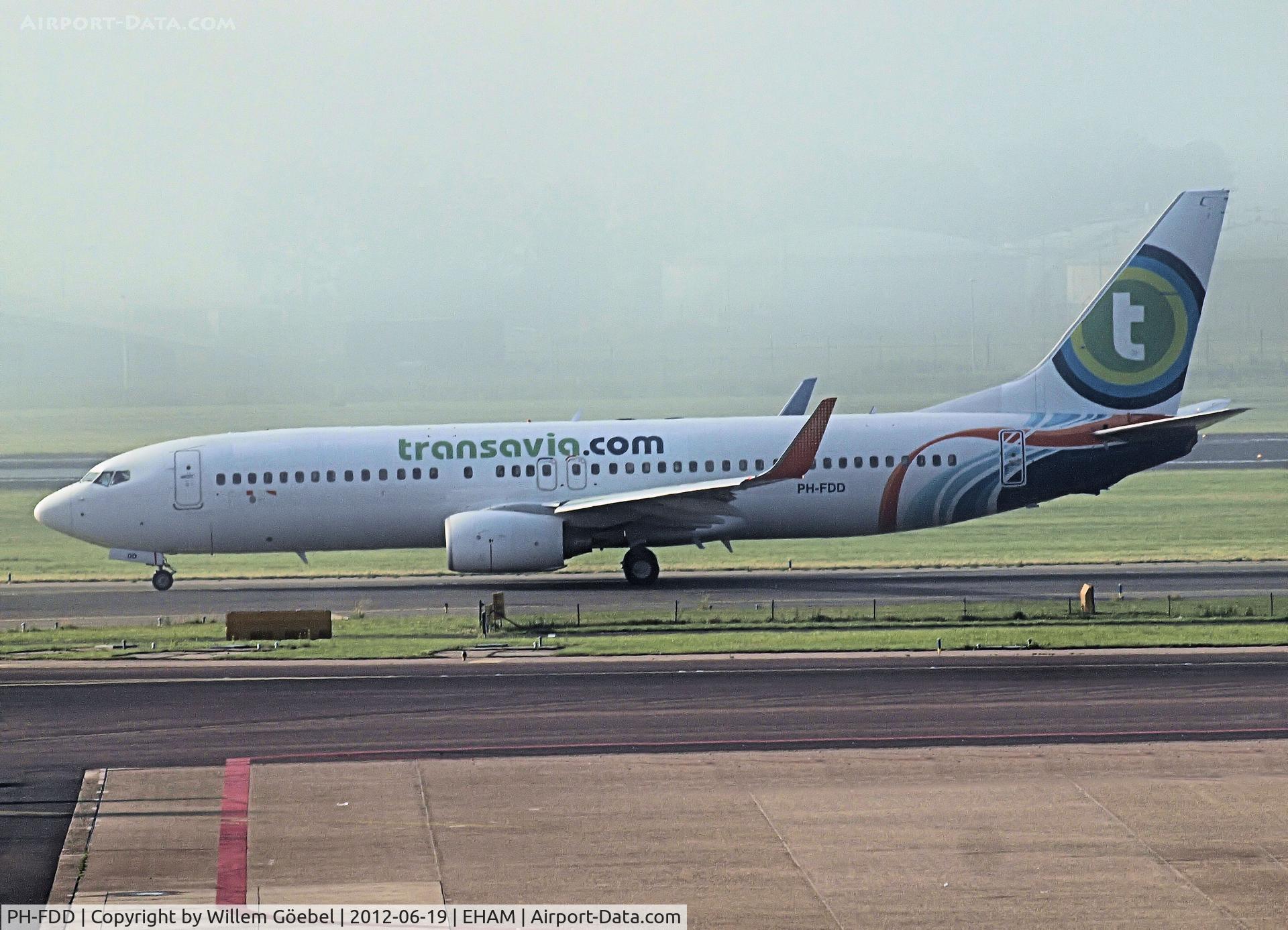 PH-FDD, 2009 Boeing 737-8KN C/N 40234, Taxi (in the mist) to runway 24 of Amsterdam Airport (Before A6-FDD)