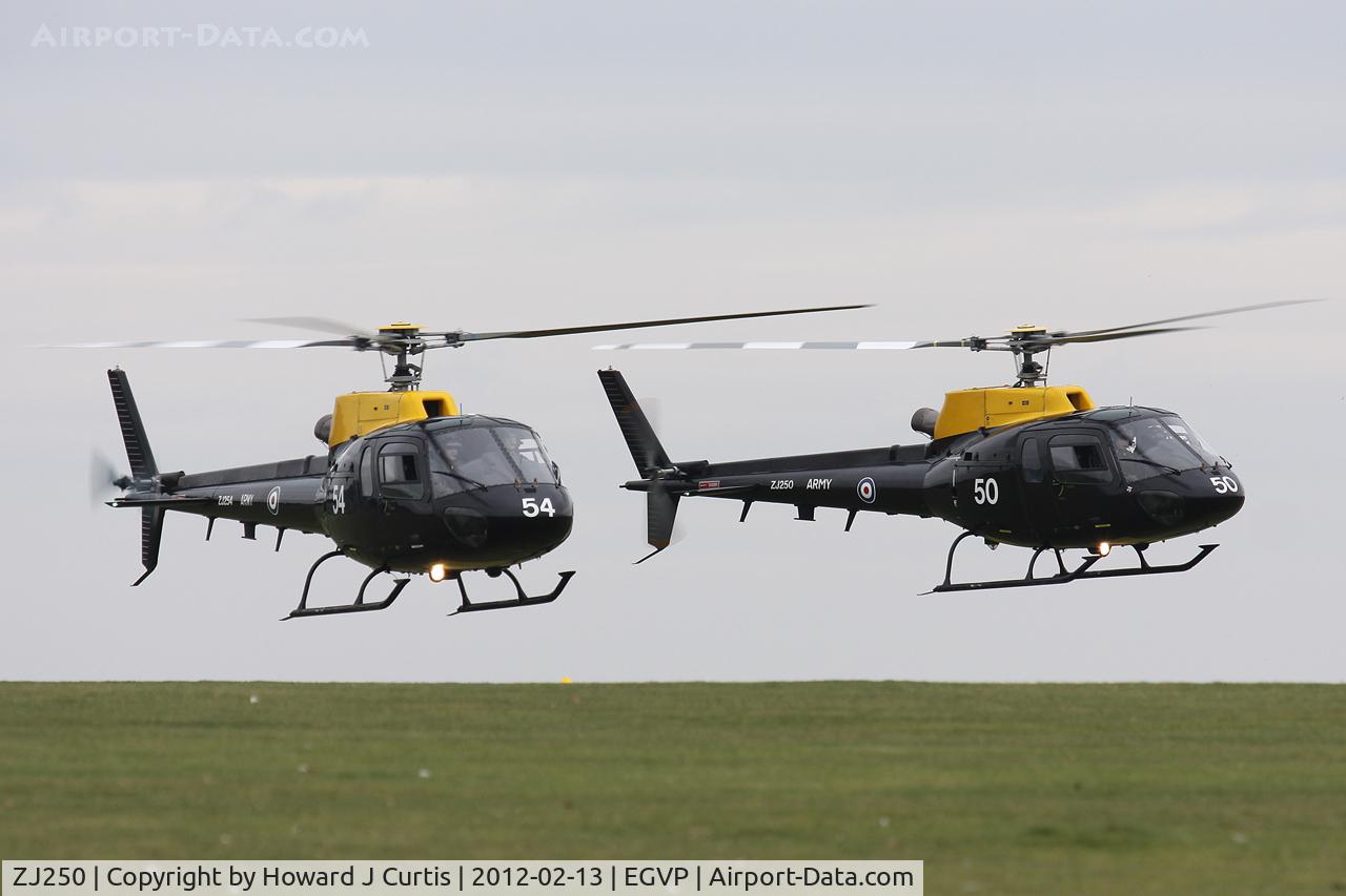 ZJ250, 1997 Eurocopter AS-350BB Squirrel HT2 Ecureuil C/N 3047, In formation with ZJ254, about to depart.