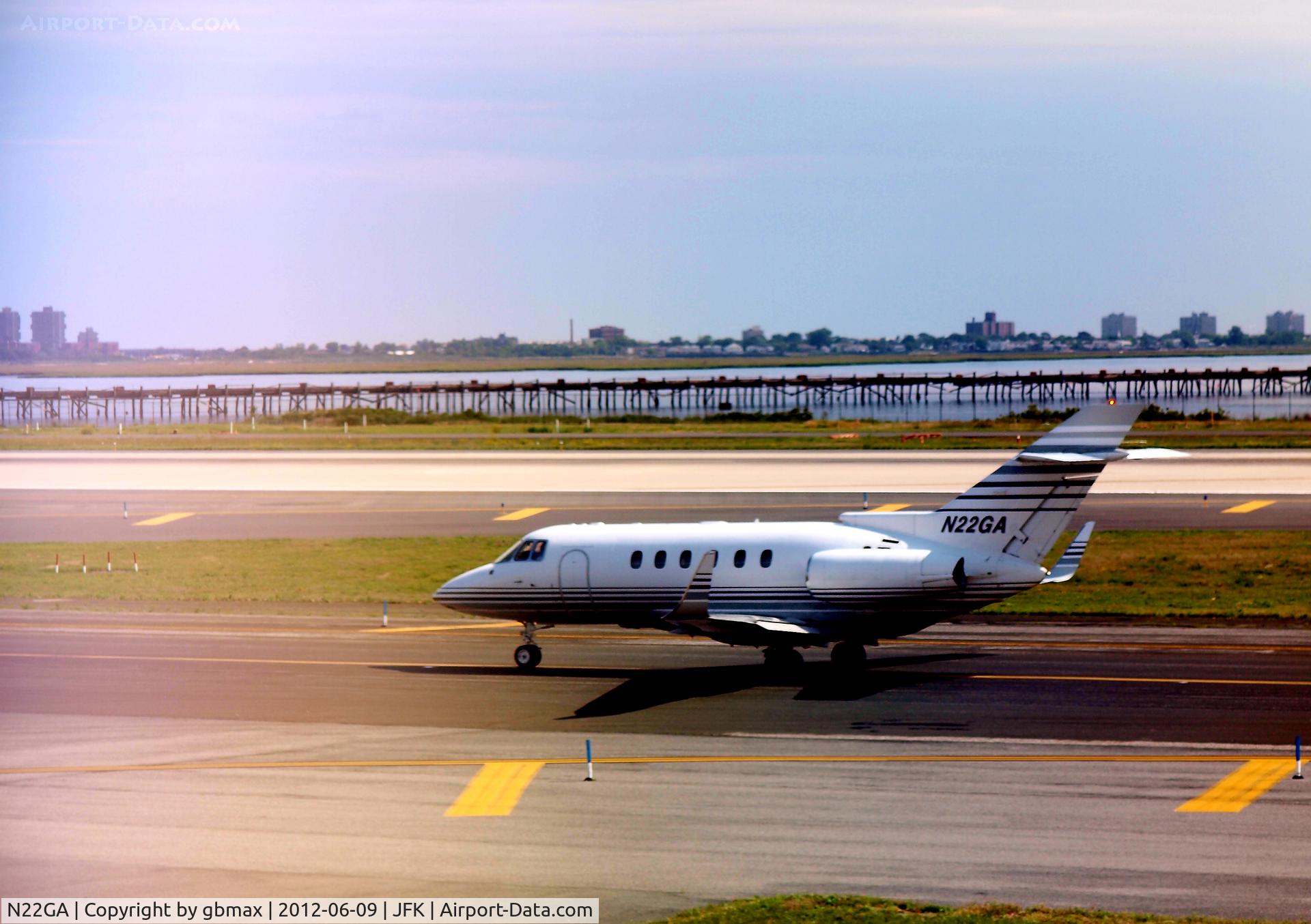 N22GA, 1997 Raytheon Hawker 800XP C/N 258327, Picture taken thru A380 window....Takeoff @JFK