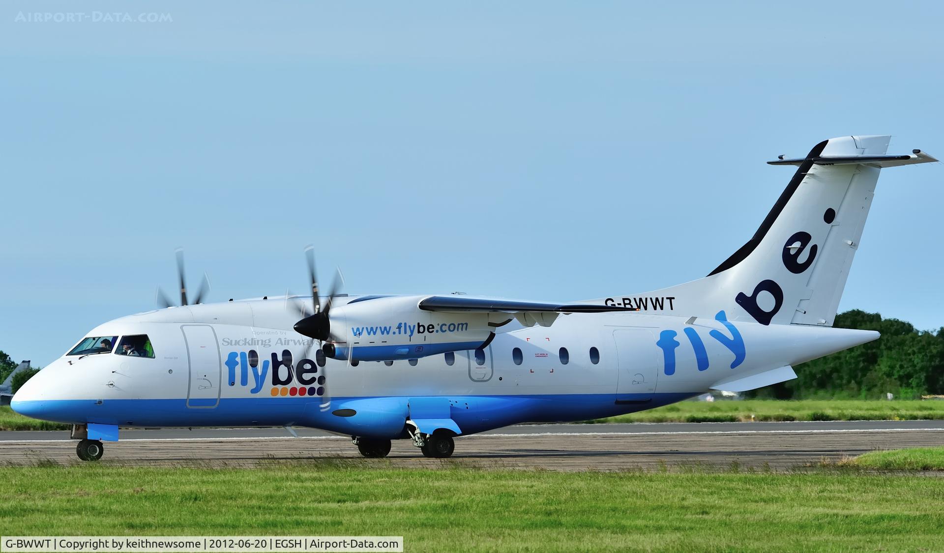 G-BWWT, 1995 Dornier 328-100 C/N 3022, Taxying into the setting sun.