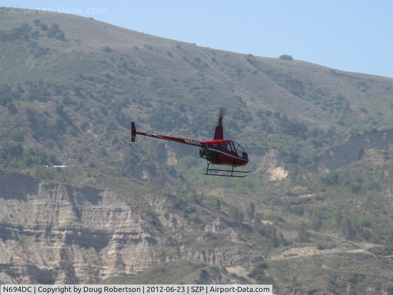 N694DC, 2004 Robinson R22 Beta C/N 3573, 2004 Robinson R44 BETA II, Lycoming O-360 derated to 131 Hp, approach to land from river route