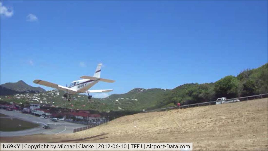 N69KY, 1973 Piper PA-28-180 C/N 28-7305300, Landing at St Barts, June 10 2012.  Excellent landing.