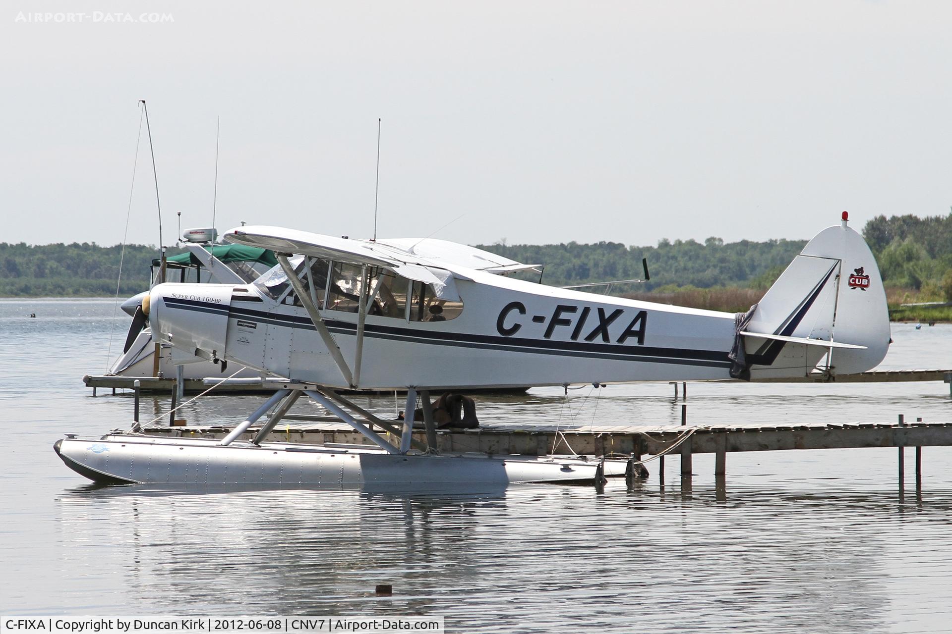 C-FIXA, 1978 Piper PA-18-150 Super Cub C/N 18-7809068, Cub float plane on o private dock near Partidge Point