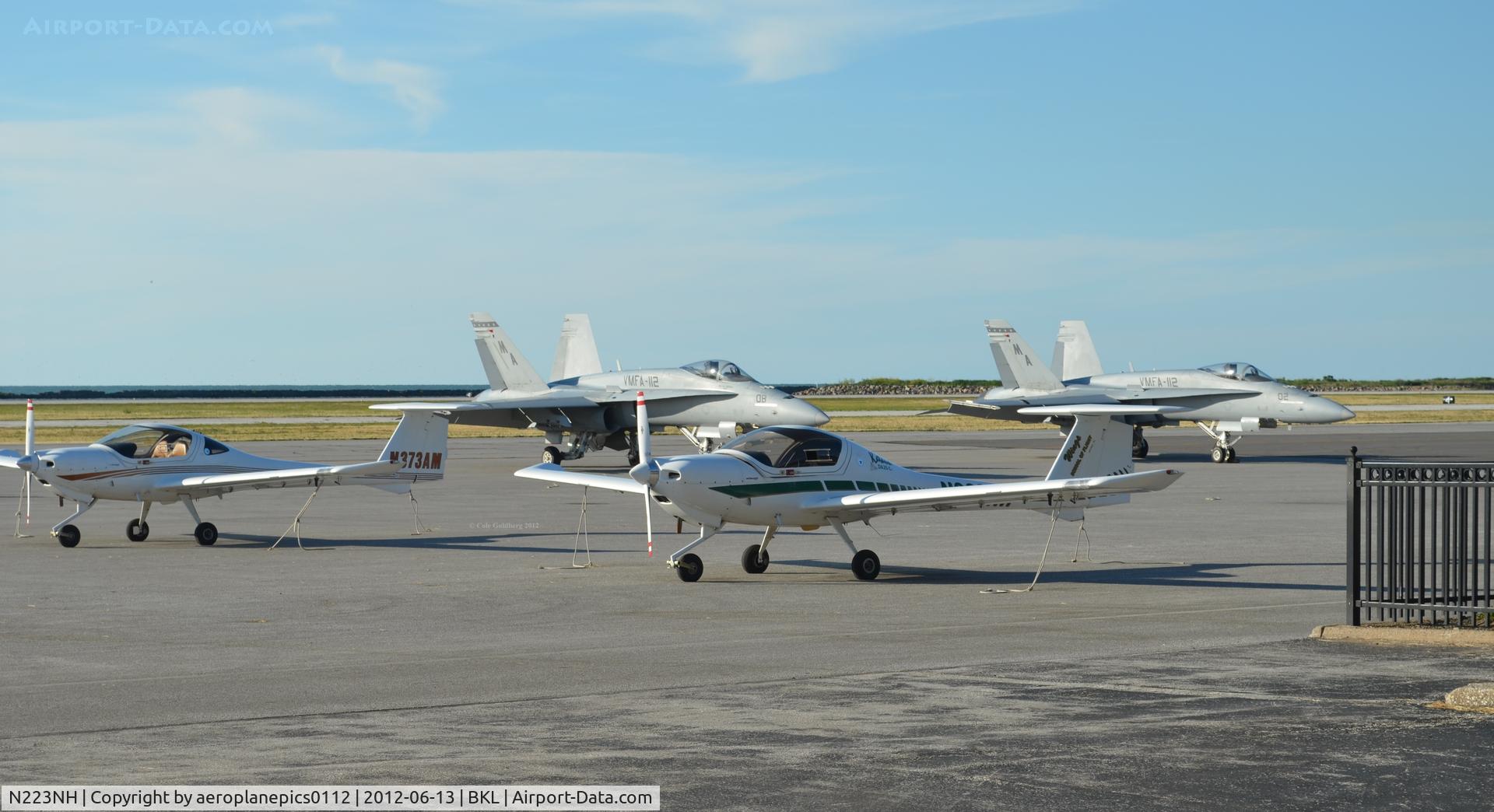 N223NH, 2000 Diamond DA-20C-1 Eclipse C/N C0113, N223NH, N373AM, 162882 and, 162428 seen on the tarmac at Burke Lakefront International Airport.