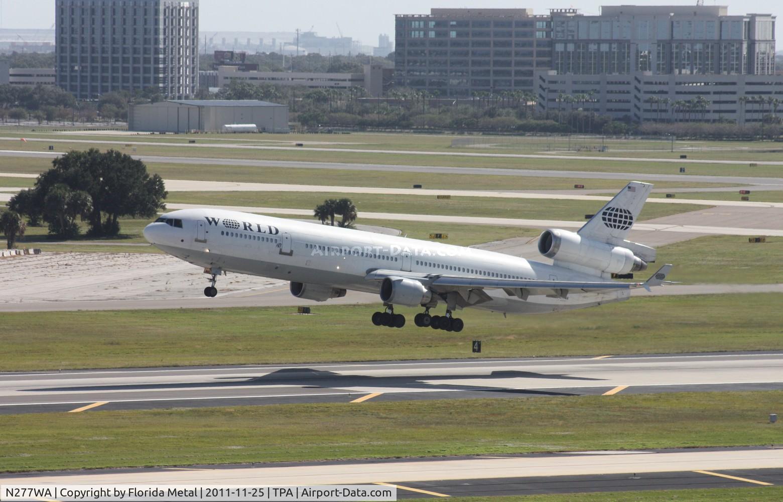 N277WA, 1995 McDonnell Douglas MD-11 C/N 48743, I was picking up my friend Carmen the day after Thanksgiving, just made it up to the parking deck in time to grab my camera for this short field take off of a World MD-11