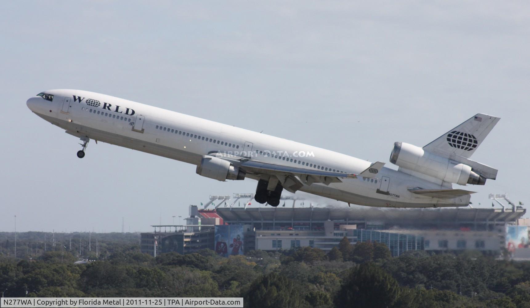 N277WA, 1995 McDonnell Douglas MD-11 C/N 48743, World MD-11 in front of Raymond James Stadium, home of the Tampa Bay Buccaneers NFL team