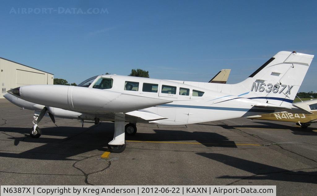 N6387X, 1978 Cessna 402B C/N 402B1350, Cessna 402B Businessliner on the line.