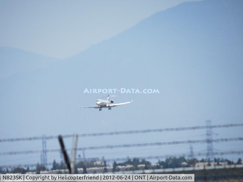 N823SK, 2008 Bombardier CRJ-900ER (CL-600-2D24) C/N 15205, On final for 26L
