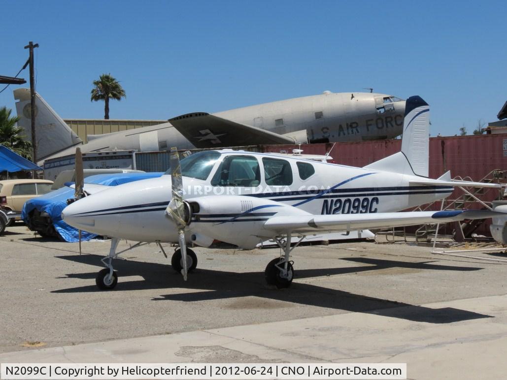 N2099C, 1959 Beech 95 Travel Air C/N TD-276, Parked in the paint shop area and appears to being prepared for painting