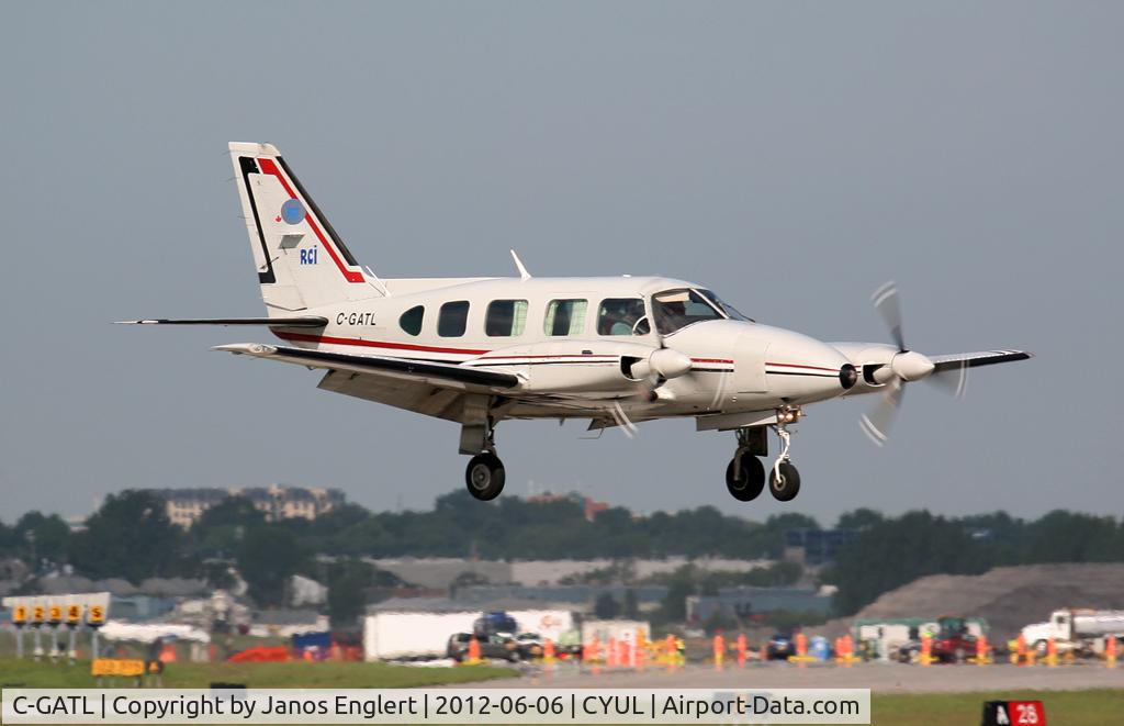 C-GATL, 1981 Piper PA-31 Navajo C/N 318112047, Landing on Runway 06R