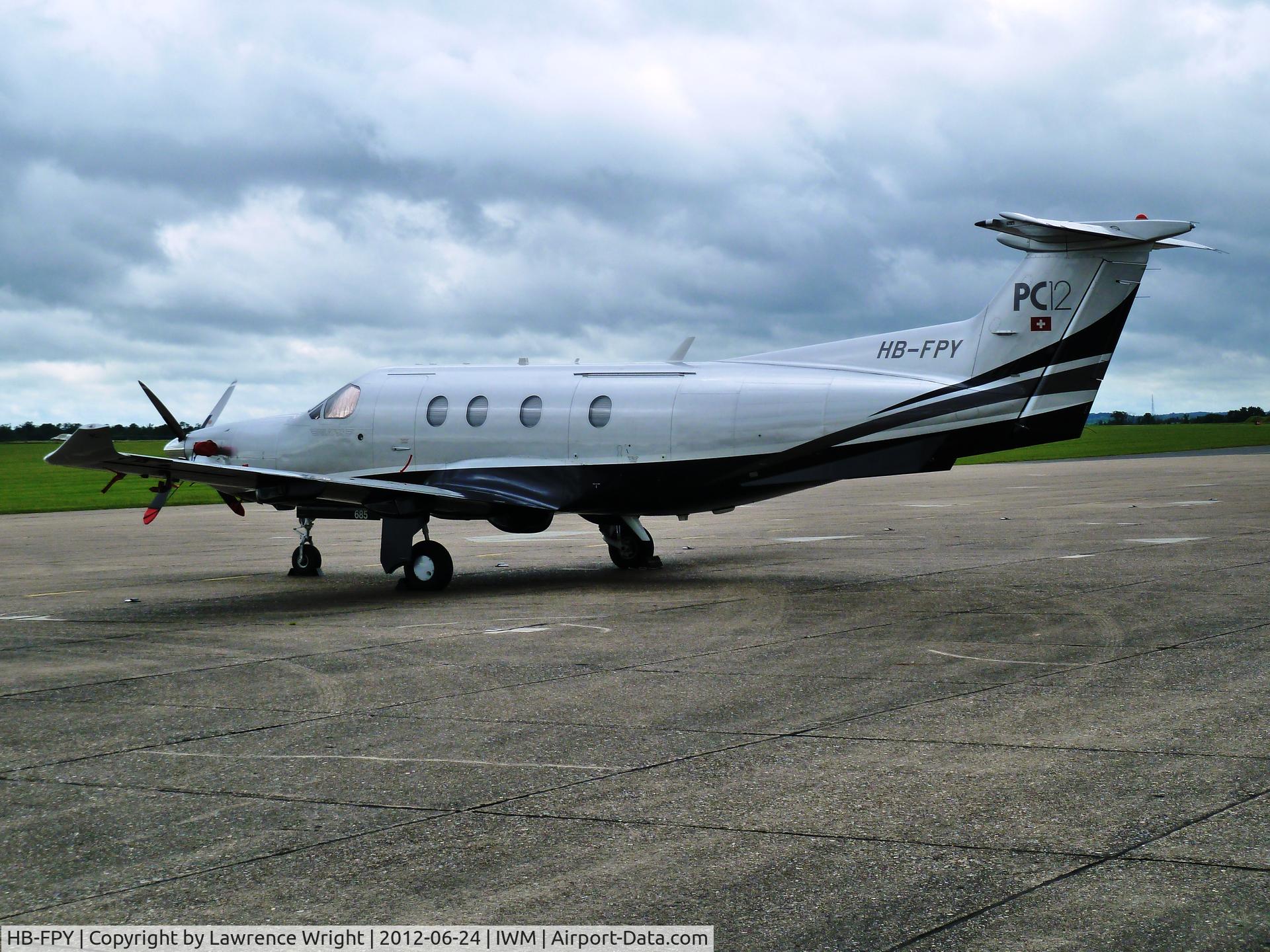 HB-FPY, 2005 Pilatus PC-12/47 C/N 685, Standing at IWM Duxford 24 June 2012