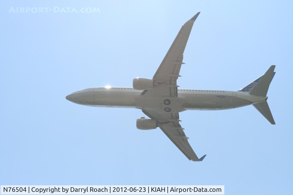 N76504, 2006 Boeing 737-824 C/N 31604, UAL B738 departs 9 with the sun high above.