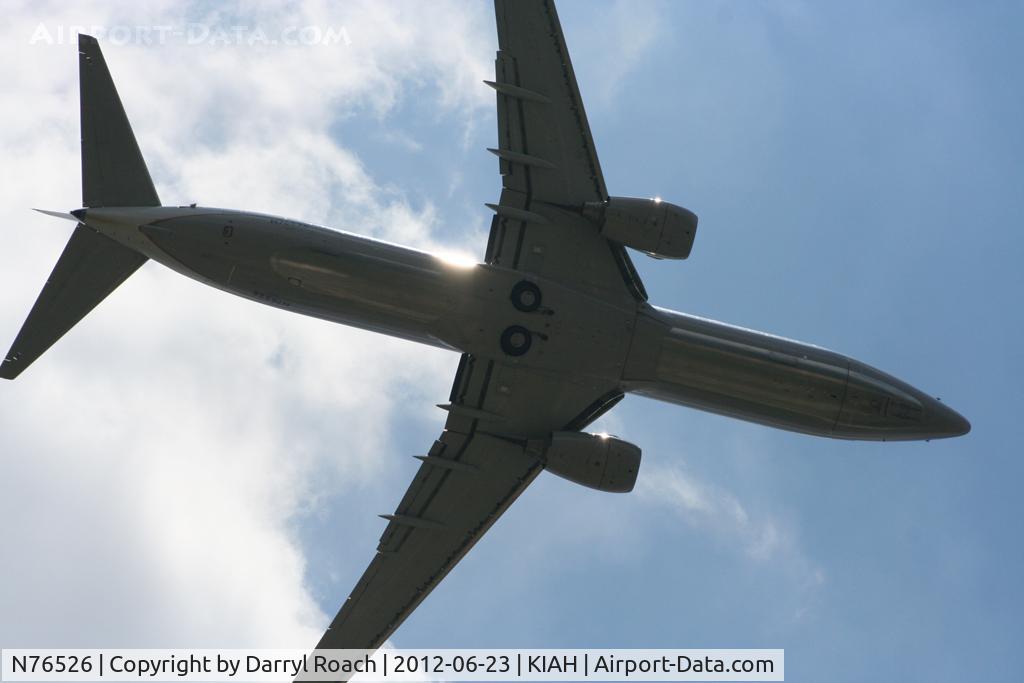 N76526, 2010 Boeing 737-824 C/N 38700, UAL B738 departs 9 with the sun high above.