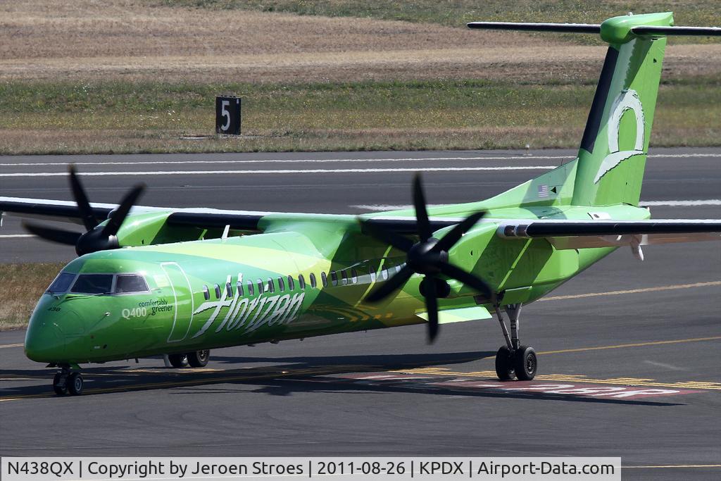 N438QX, 2009 Bombardier DHC-8-402 Dash 8 C/N 4243, green