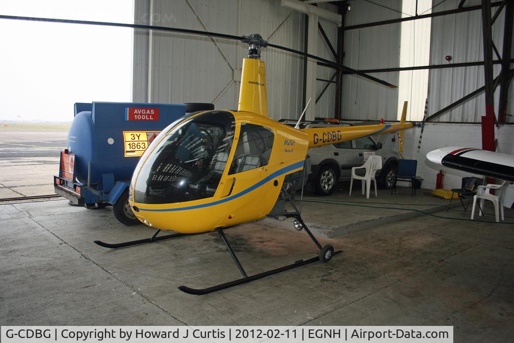 G-CDBG, 2004 Robinson R22 Beta II C/N 3682, Hangared.
