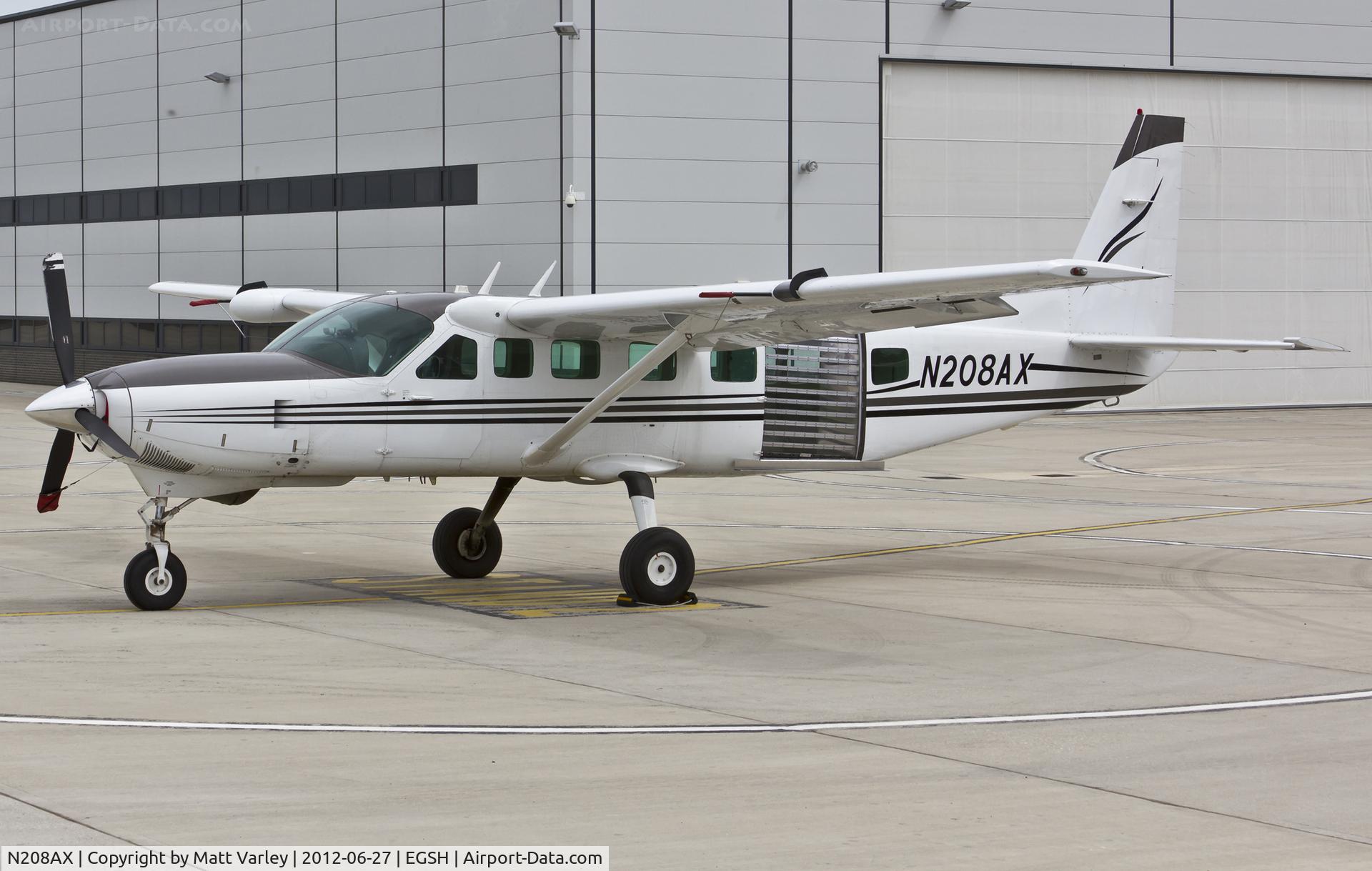 N208AX, 1998 Cessna 208B Grand Caravan C/N 208B0710, Sat on stand at SaxonAir.