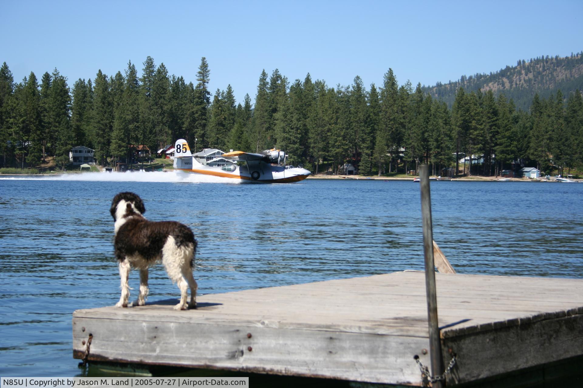 N85U, Consolidated PBY-6A Catalina C/N 64041, N85U scoops up water from Loon Lake in eastern Washington State for fighting a nearby forest fire.