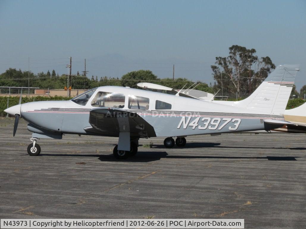N43973, 1977 Piper PA-28R-201T Cherokee Arrow III C/N 28R-7703322, Parked north of Howard Aviation