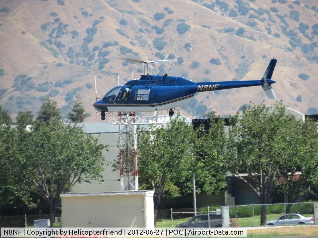 N8NF, 1978 Bell 206B JetRanger C/N 2537, Getting ready to set it down and pick up tower people