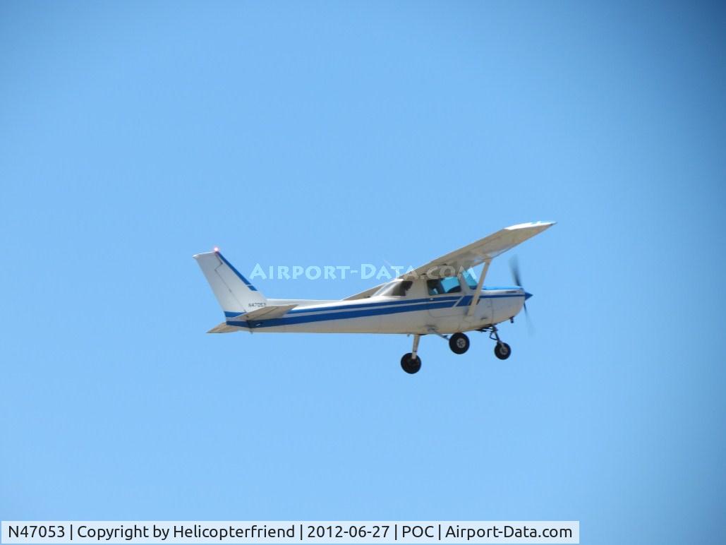 N47053, 1979 Cessna 152 C/N 15283163, Climbing out after take off from 26R