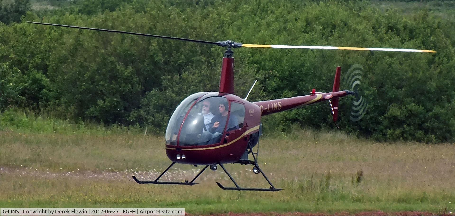 G-LINS, 1989 Robinson R22 Beta C/N 1201, Hover practice at EGFH.