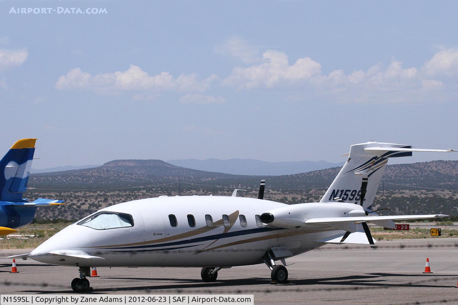N159SL, 2006 Piaggio P-180 Avanti II C/N 1121, On the ramp in Santa Fe, New Mexico.