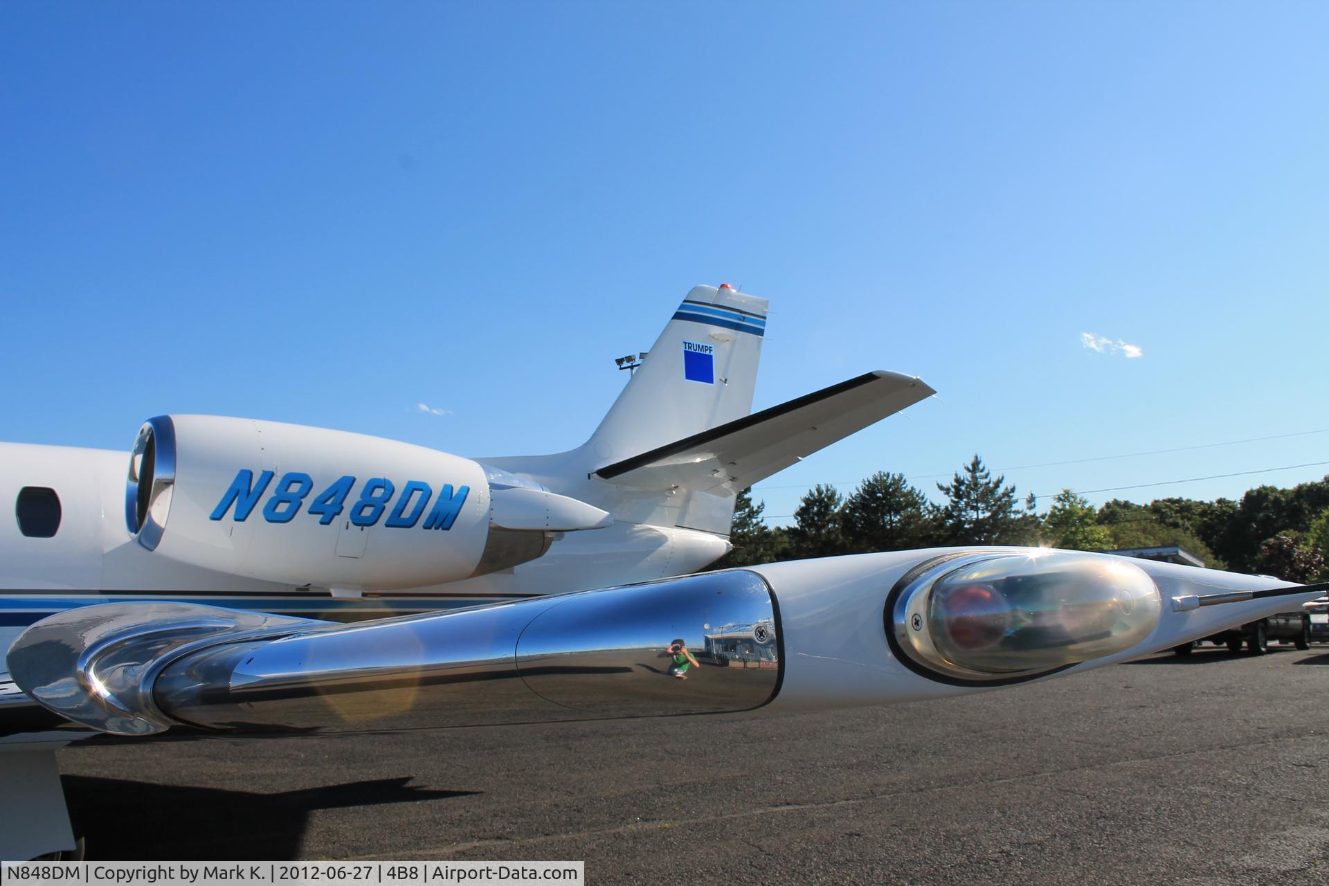 N848DM, 2003 Cessna 560XL Citation Excel C/N 560-5329, Wing tip and tail of N848DM.