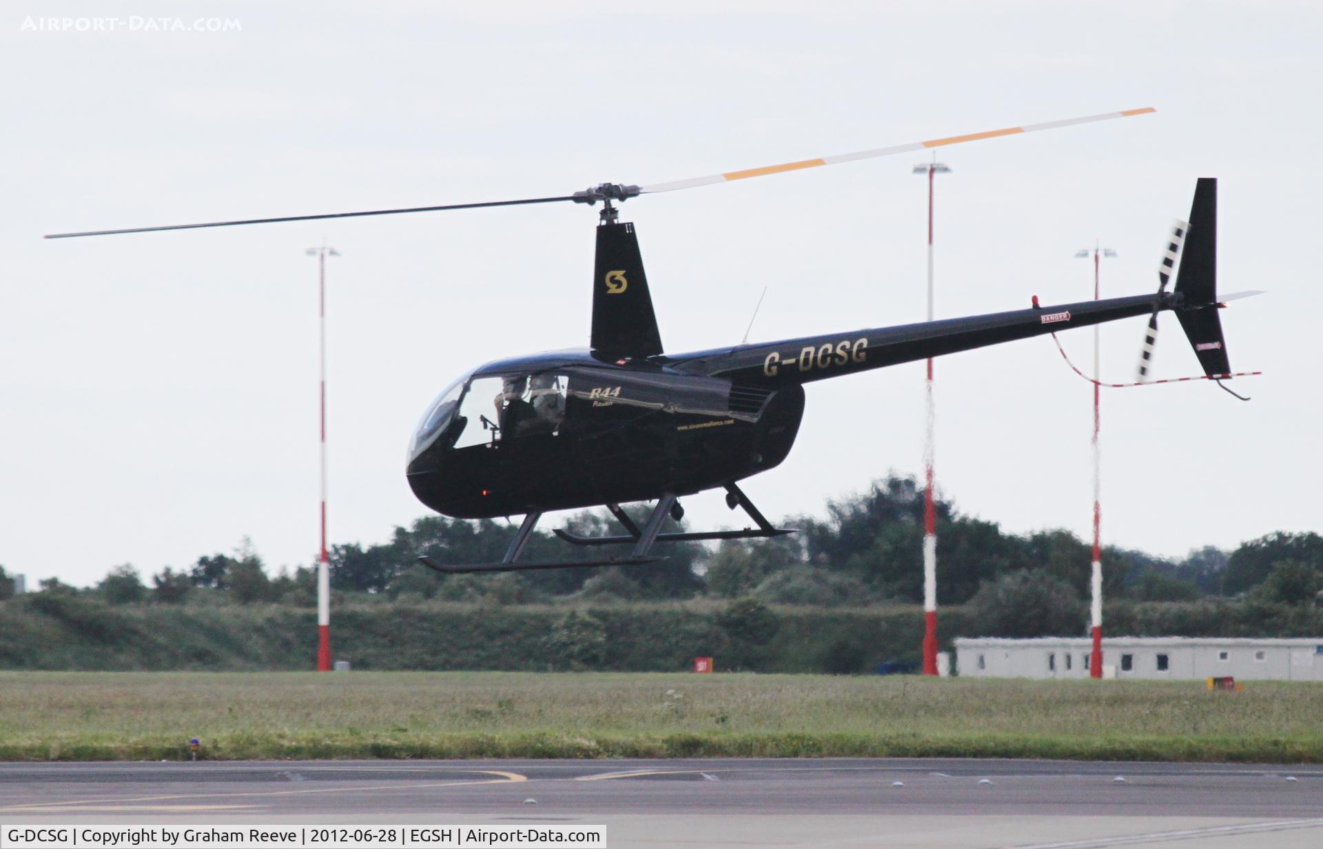 G-DCSG, 2000 Robinson R44 Raven C/N 0960, Departing from Norwich.
