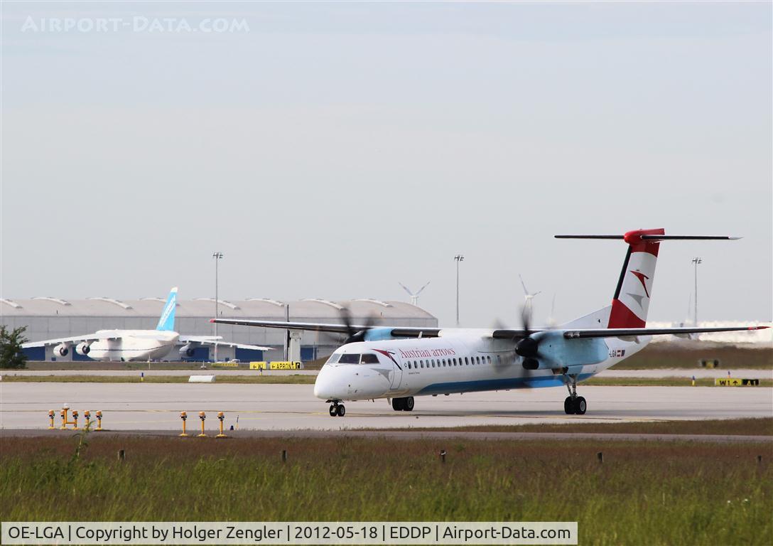 OE-LGA, 1999 De Havilland Canada DHC-8-402Q Dash 8 C/N 4014, Waiting at holding point A1 for the voice from tower....