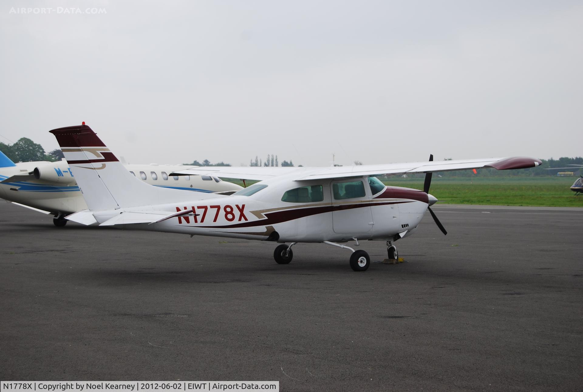 N1778X, 1975 Cessna 210L Centurion C/N 21060798, Seen parked on the apron at Weston.