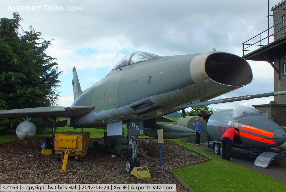 42163, North American F-100D Super Sabre C/N 223-43, Former French Air Force F-100D now painted in USAF markings as 54-2163 and dedicated to the US Air National Guard and is depicted as one flown by Capt. John M. Haley, 174th TFS, Iowa Air National Guard, during the squadron’s tour in Vietnam.