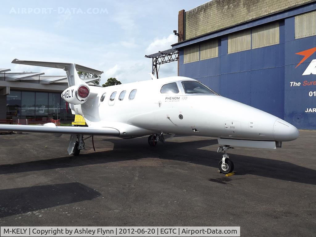 M-KELY, 2009 Embraer EMB-500 Phenom 100 C/N 50000040, Outside the IAE hangar. Took this after finishing work.