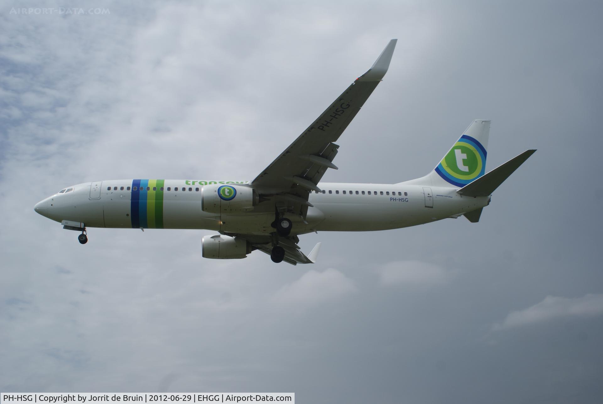 PH-HSG, 2012 Boeing 737-8K2 C/N 39262, Just a little bit high for landing, but the PH-HSG brought bad weather from Heraklion to Eelde.