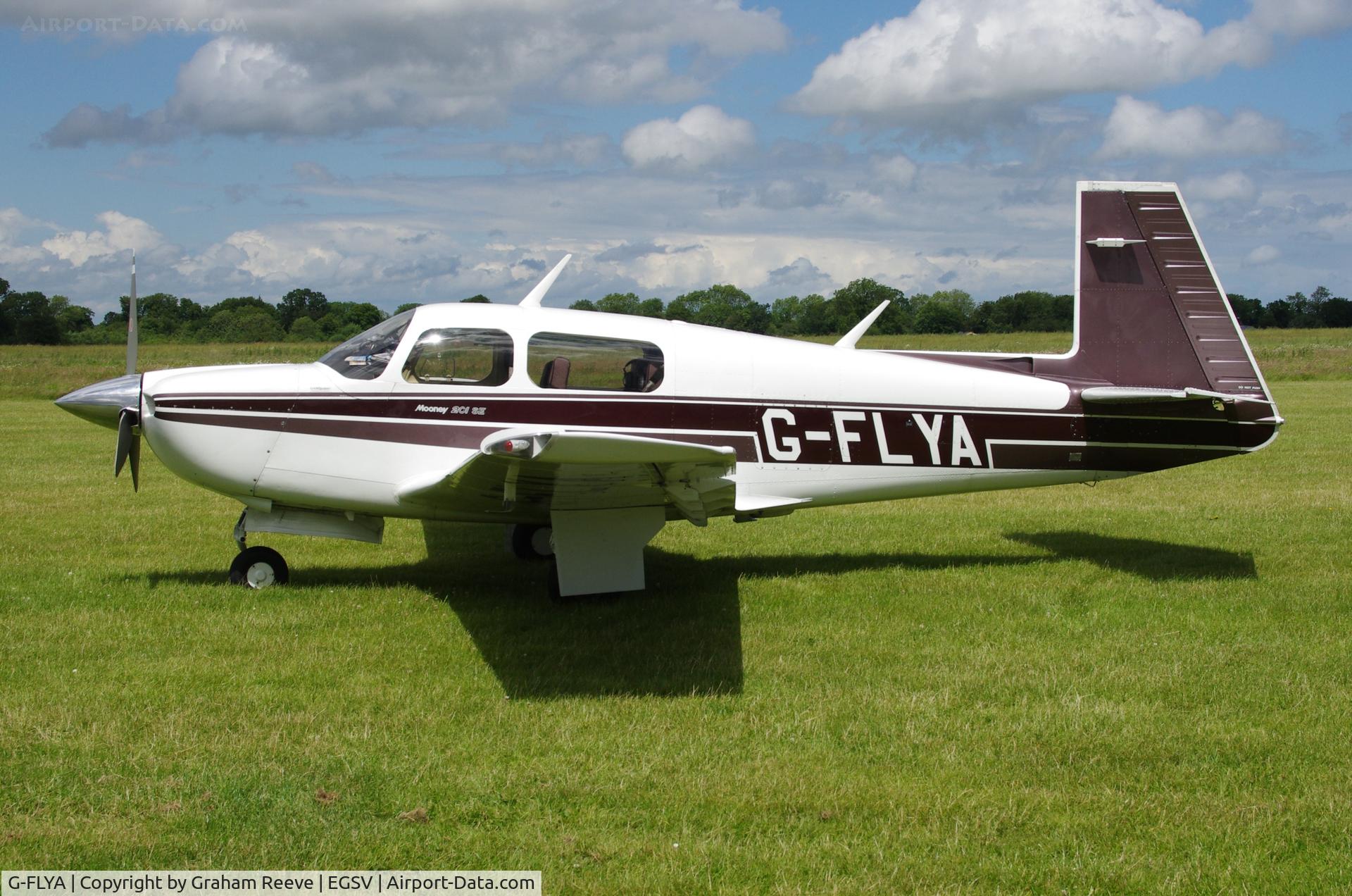 G-FLYA, 1989 Mooney M20J 201 C/N 24-3124, Parked at Old Buckenham.