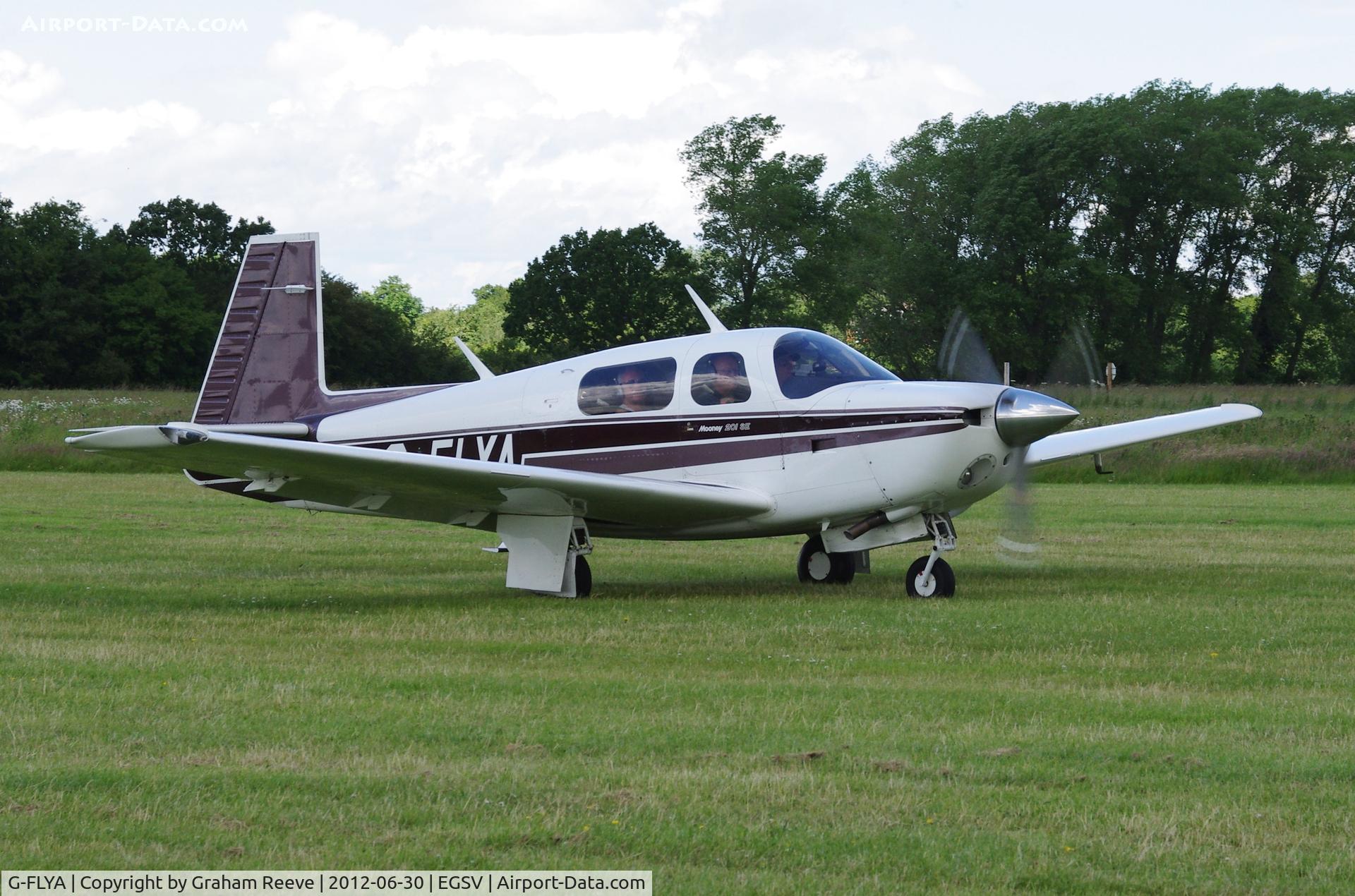 G-FLYA, 1989 Mooney M20J 201 C/N 24-3124, Just landed.