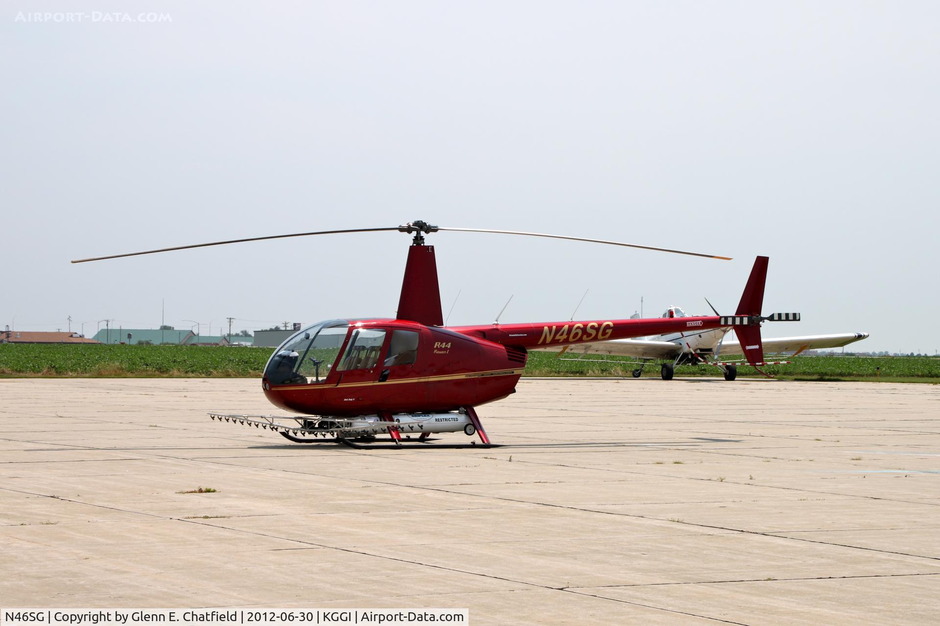 N46SG, 2004 Robinson R44 C/N 1413, Being made ready for crop-dusting.