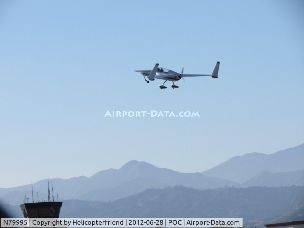 N79995, 1994 Rutan Long-EZ C/N 1897-L, Climbing out and heading westbound